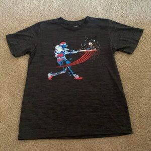 A dark gray shirt. Fits a little bigger, but overall looks great on.